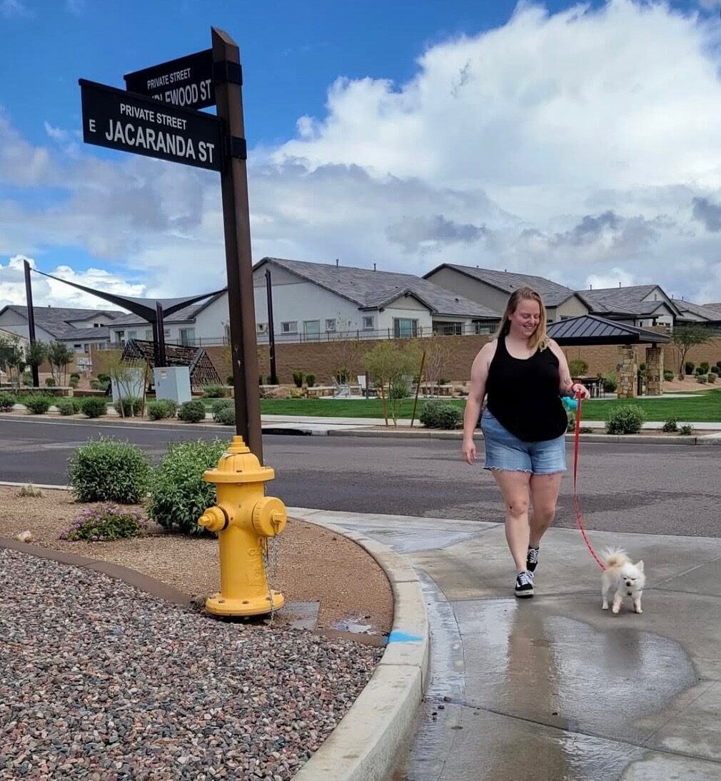 Kenna walking a dog